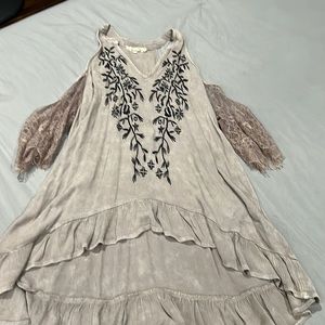 This top is gimmicks brand by BKE.